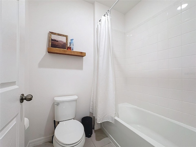 bathroom featuring toilet, tile patterned flooring, and shower / bath combination with curtain