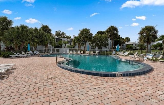 view of pool featuring a patio