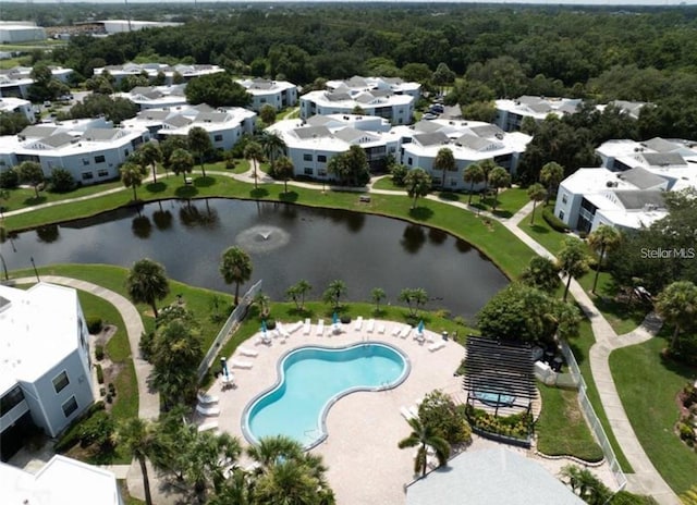 drone / aerial view with a water view