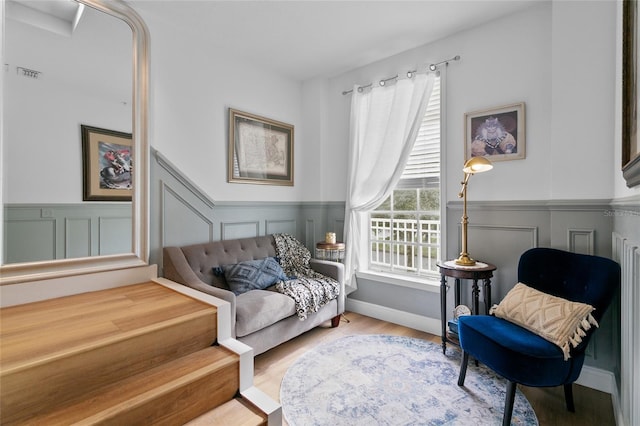 living area with light hardwood / wood-style floors