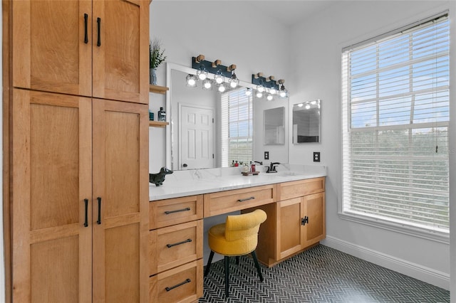 bathroom with vanity and tile patterned flooring