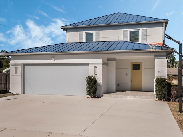 view of front of property with a garage