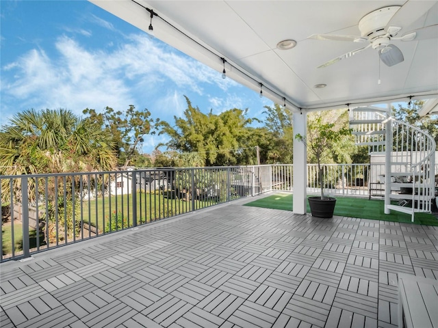 view of patio with ceiling fan