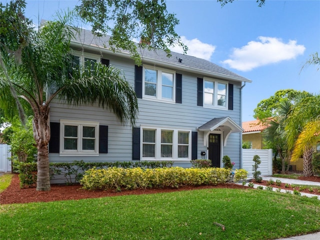 view of front facade with a front lawn