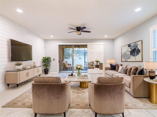 living room featuring ceiling fan