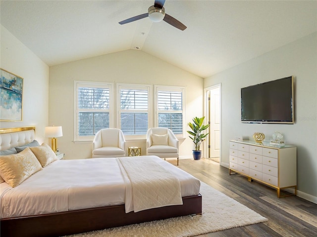 bedroom with ceiling fan, dark hardwood / wood-style floors, and lofted ceiling