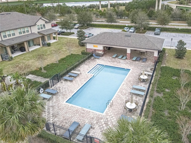 view of swimming pool with a patio