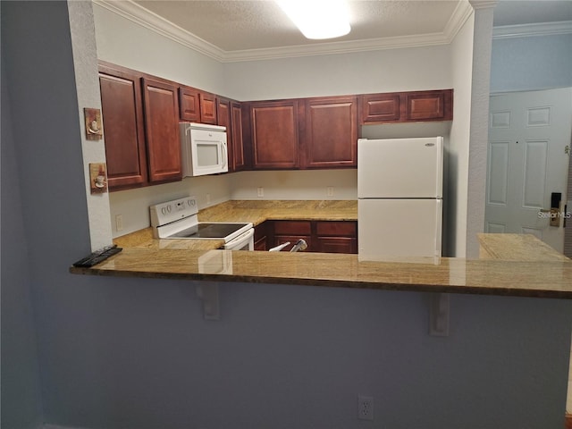 kitchen featuring a breakfast bar area, kitchen peninsula, white appliances, and ornamental molding