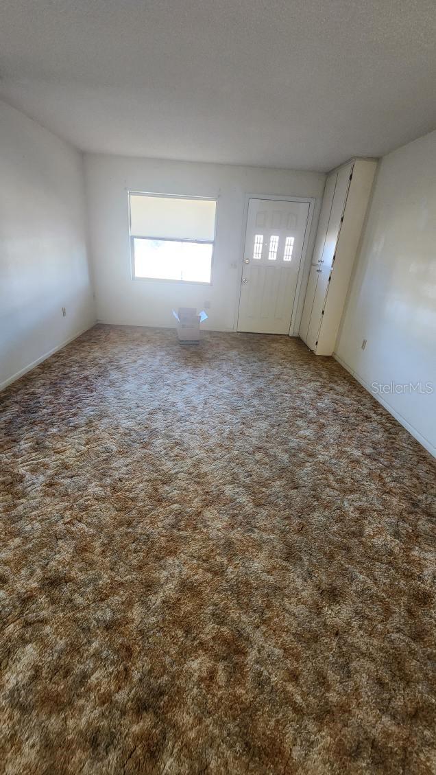 interior space featuring carpet flooring