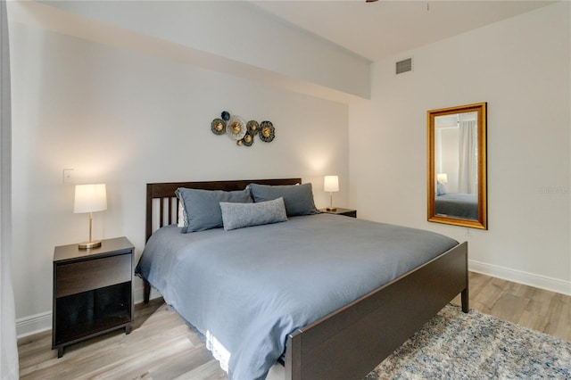 bedroom featuring light wood-type flooring