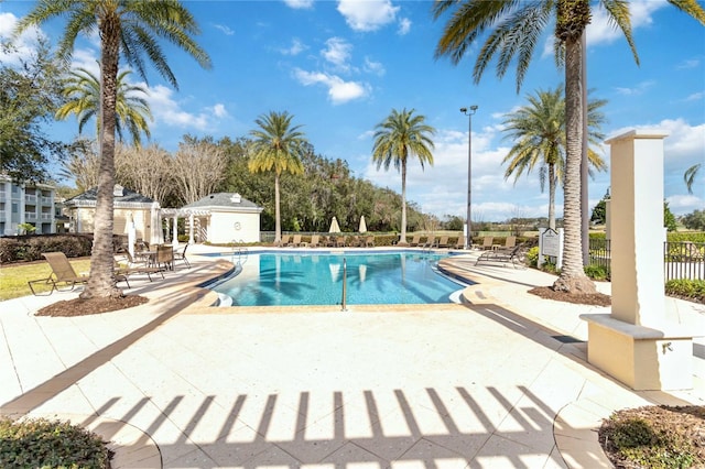 view of swimming pool with a patio