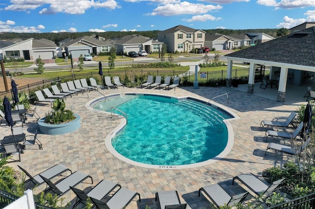 view of pool with a patio area and a gazebo