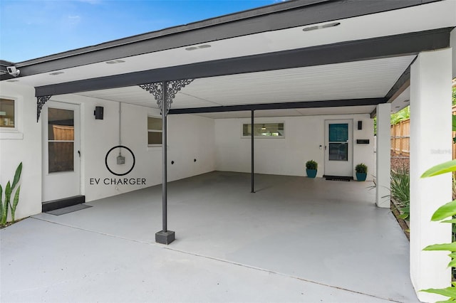 view of patio / terrace featuring a carport