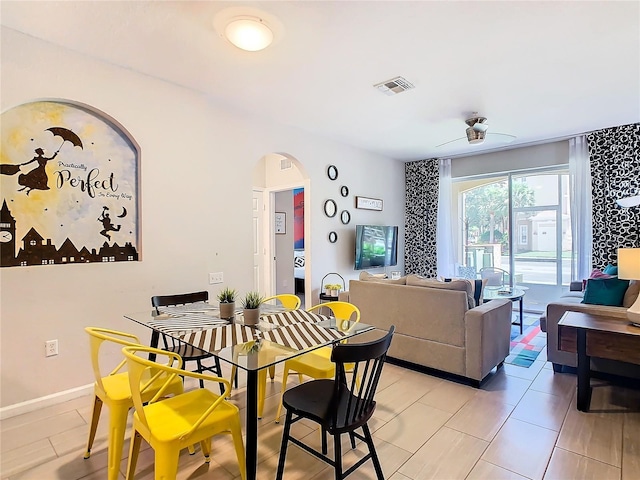 dining area featuring ceiling fan