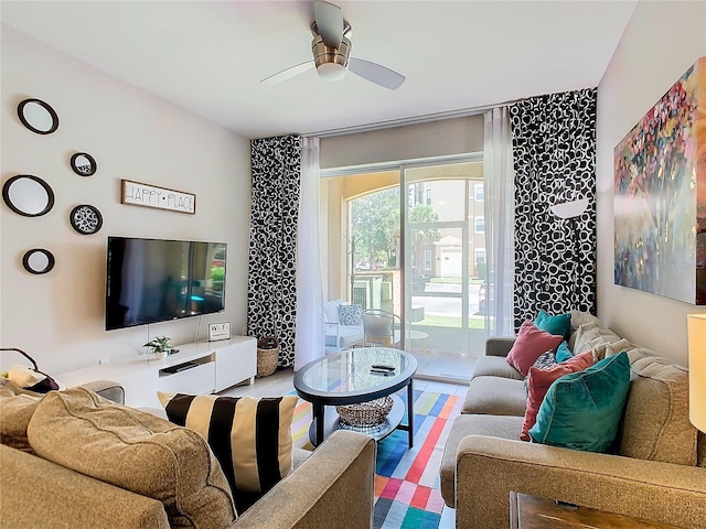 living room featuring ceiling fan