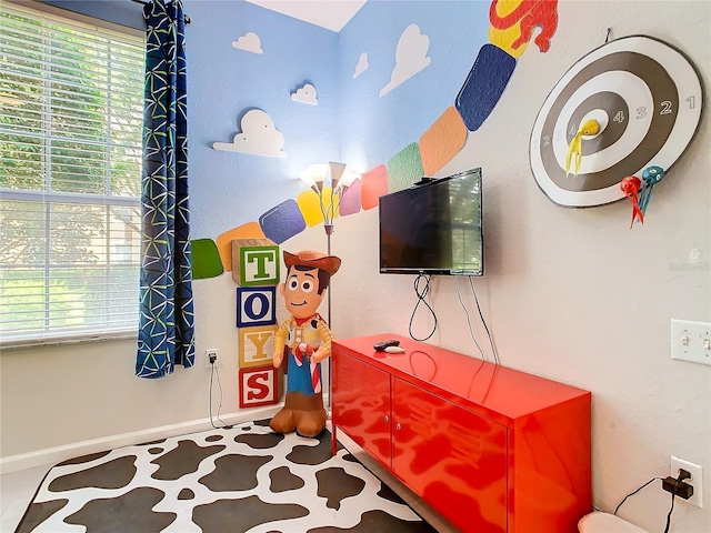 recreation room featuring a wealth of natural light