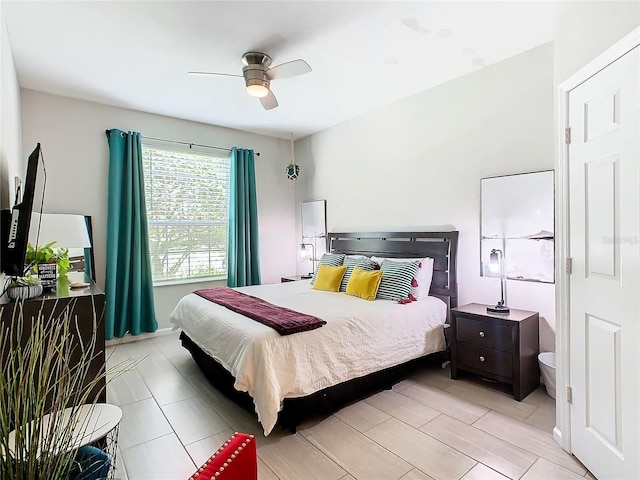 bedroom featuring ceiling fan