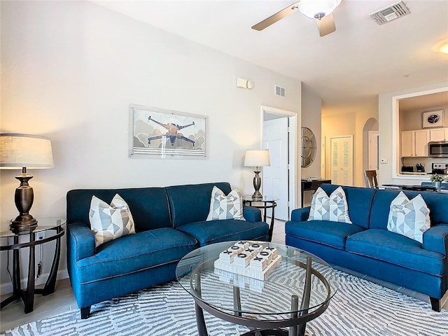 living room featuring ceiling fan