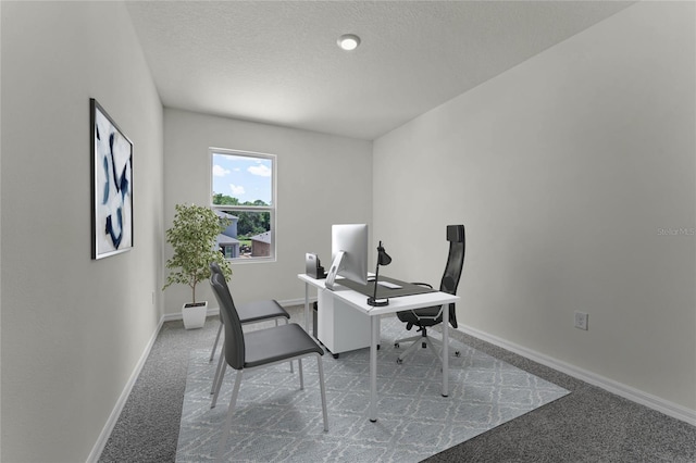 office featuring carpet floors and a textured ceiling