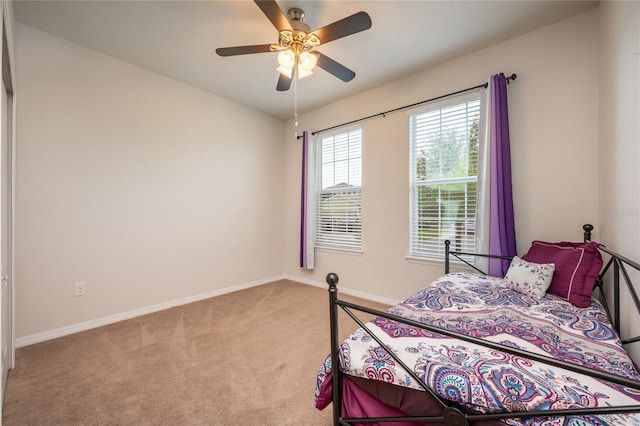 bedroom featuring carpet and ceiling fan