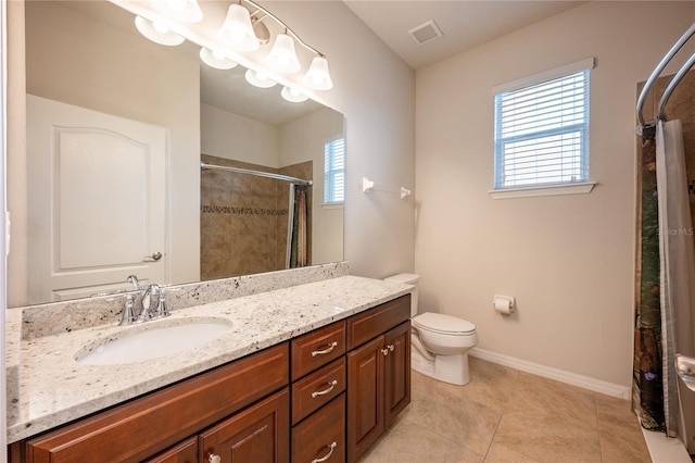 bathroom with vanity, tile patterned floors, toilet, and a shower with shower curtain