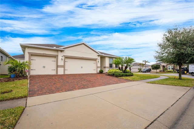 view of front of property with a garage