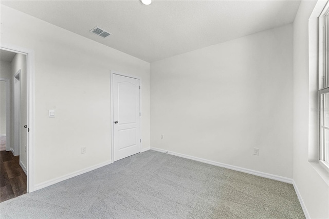 unfurnished bedroom with carpet flooring