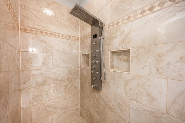 details featuring a tile shower