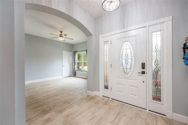 entryway with light wood-type flooring and ceiling fan