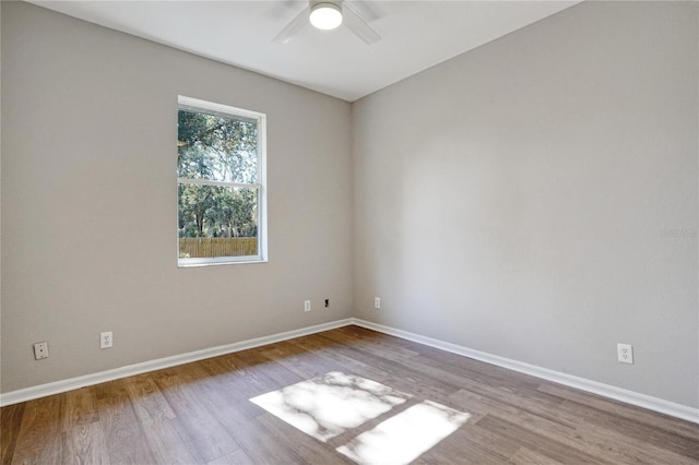 unfurnished room with ceiling fan and light hardwood / wood-style flooring