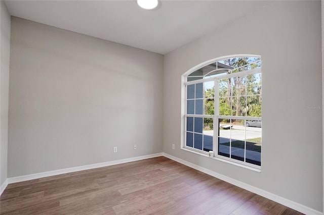 empty room featuring hardwood / wood-style floors