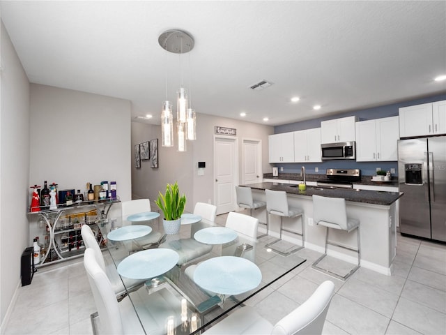 dining room with light tile patterned floors