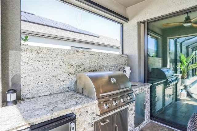 view of patio / terrace featuring grilling area and exterior kitchen