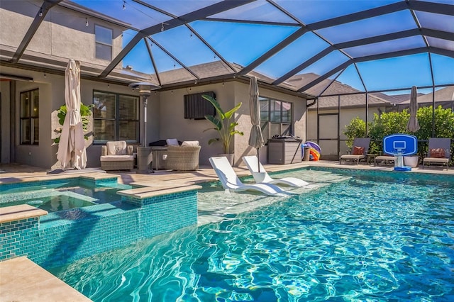 view of swimming pool with an outdoor living space, a patio, and glass enclosure