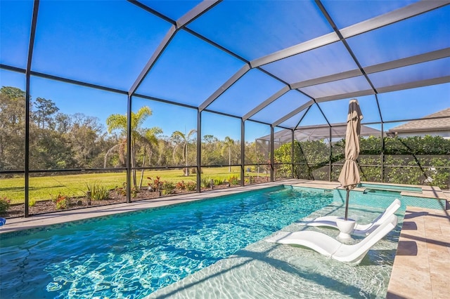 view of swimming pool featuring an in ground hot tub, a lanai, and a patio area