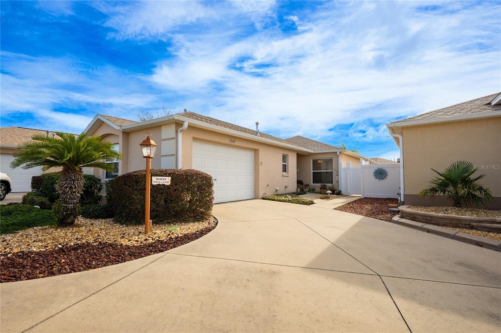 single story home with a garage