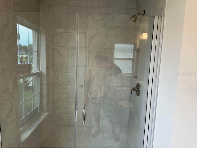 bathroom with walk in shower