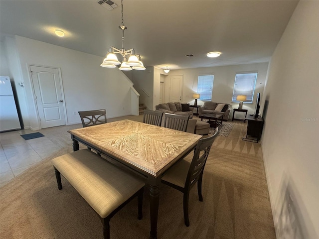 dining room with a chandelier