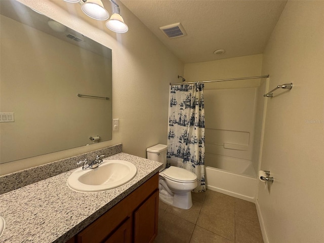 full bathroom featuring tile patterned floors, toilet, a textured ceiling, vanity, and shower / bath combination with curtain