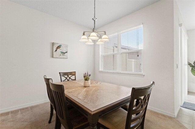 13731 Bravante Aly, Windermere, FL 34786 - dining room featuring baseboards, light carpet, and a chandelier
