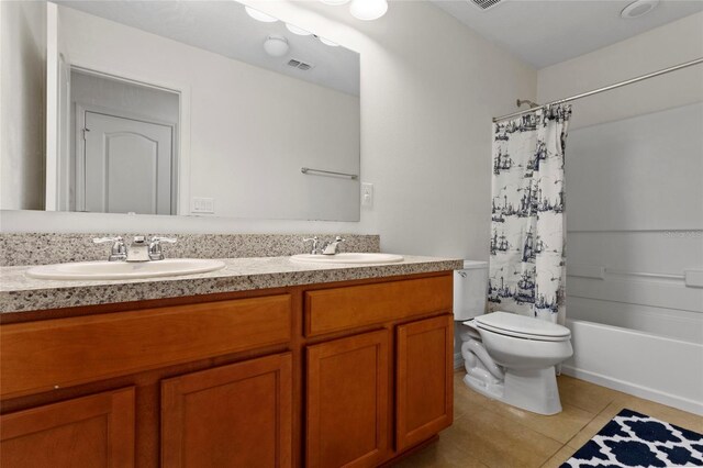 13731 Bravante Aly, Windermere, FL 34786 - bathroom with double vanity, tile patterned floors, toilet, and shower / bathtub combination with curtain