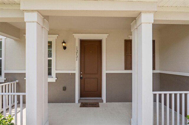 13731 Bravante Aly, Windermere, FL 34786 - property entrance featuring stucco siding
