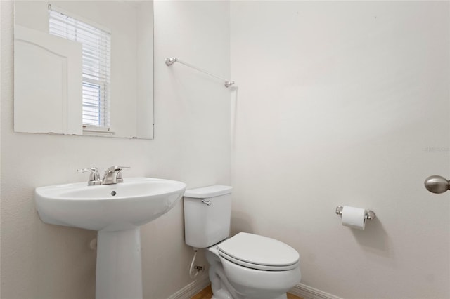 13731 Bravante Aly, Windermere, FL 34786 - half bath with toilet, baseboards, and a sink