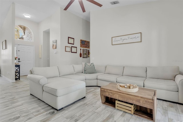 living room featuring ceiling fan