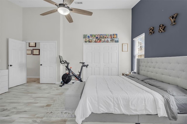 bedroom featuring ceiling fan and a closet