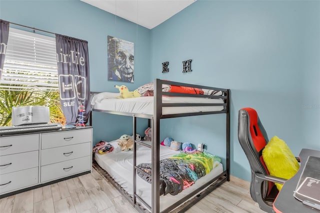 bedroom featuring light wood-type flooring