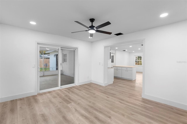 unfurnished living room featuring recessed lighting, light wood-style floors, and ceiling fan