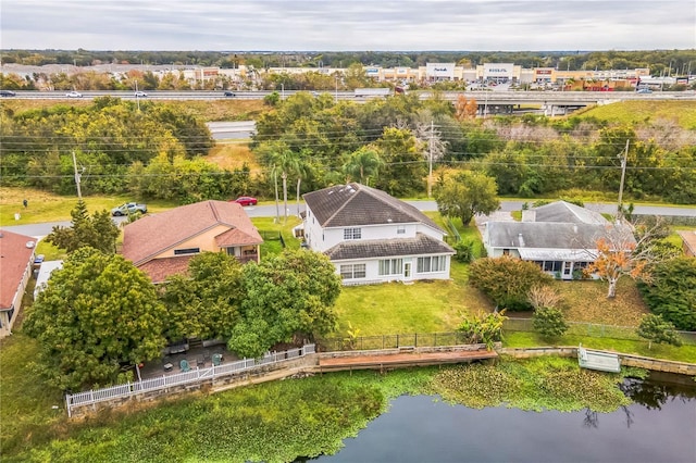 bird's eye view with a water view