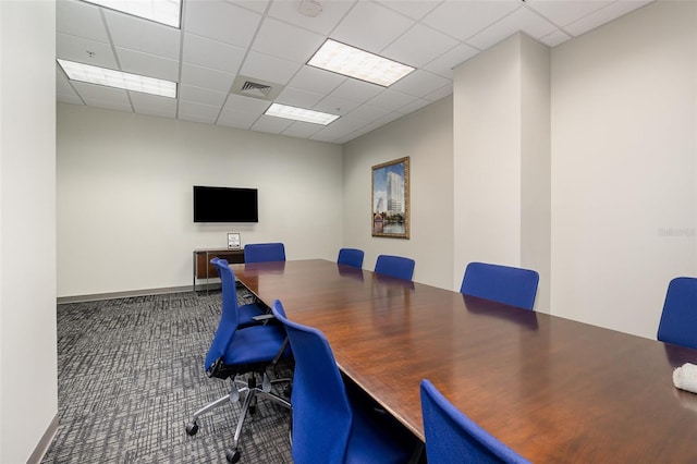 office space featuring carpet flooring and a drop ceiling