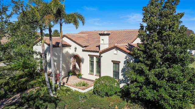 back of property featuring a patio area